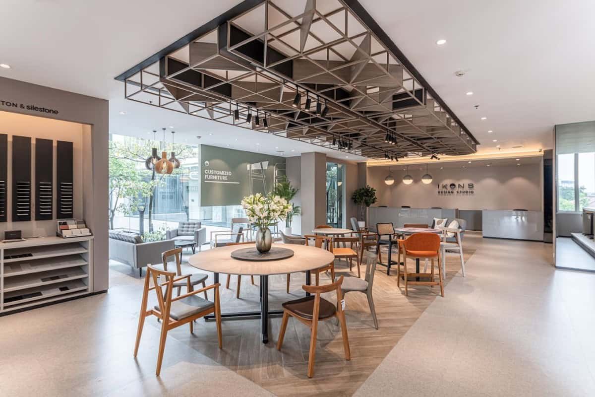 IKONS showroom with dining chairs and tables on display